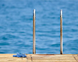 Steel and wooden ladder pier on the sea