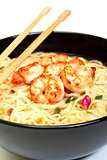 Shrimp and noodle soup bowl with chopsticks