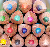 Macro detail of colorful pencils in a stack