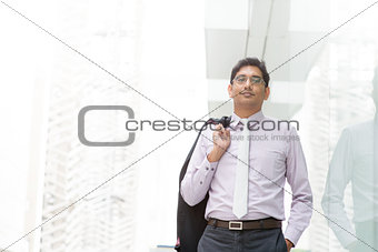 Candid Indian businessman walking
