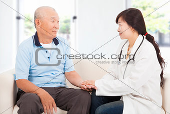 friendly doctor caring senior man indoor room