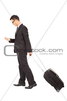  businessman walking and using phone  with briefcase 