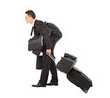 tired young businessman pulling and taking all belongings 