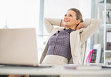 Portrait of relaxed business woman in office