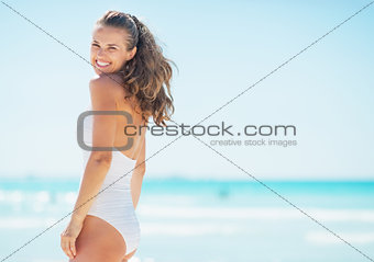Portrait of young woman at seaside