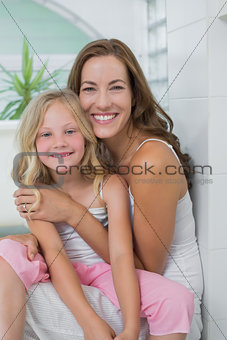 Portrait of a smiling mother and daughter