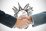 Composite image of business handshake against earth doodle