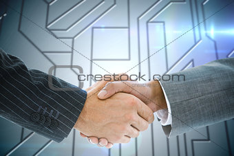 Composite image of business handshake against circuit board