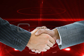 Composite image of business handshake against red background