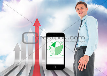 Composite image of happy businessman standing