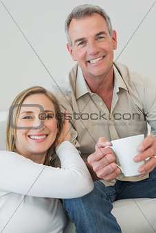 Portrait of a relaxed couple with coffee cup
