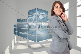 Composite image of happy businesswoman