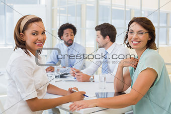 Group of happy business people in meeting at office