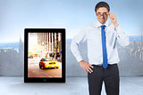 Composite image of thinking businessman tilting glasses