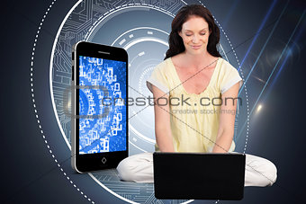 Composite image of happy woman using a laptop