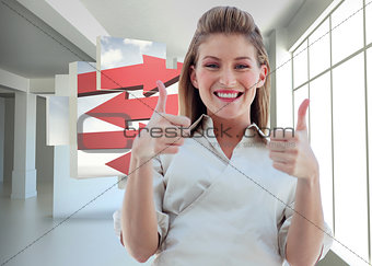Composite image of businesswoman smiling at the camera with thumbs up