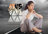 Composite image of thinking businesswoman sitting with hands together