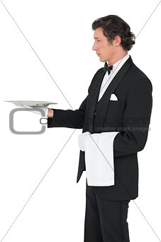 Server holding tray over white background