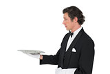 Handsome server holding tray over white background