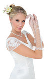 Sensuous bride posing over white background