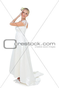 Portrait of bride posing over white background