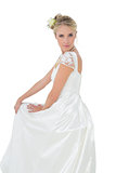 Portrait of confident bride over white background