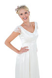 Woman in wedding dress against white background