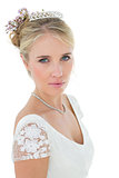 Confident bride against white background