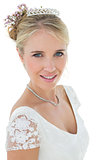 Smiling bride against white background