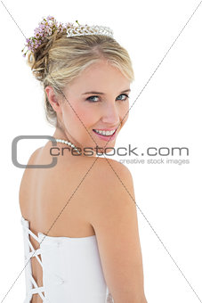 Young bride smiling over white background