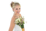 Happy bride with flower bouquet over white background
