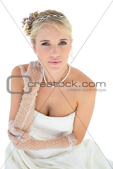 Confident bride with hand on shoulder