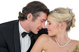 Bride and groom with head to head over white background
