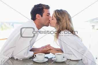 Side view of a loving couple kissing