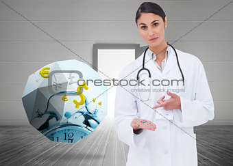 Composite image of female doctor pointing at pill in her hand