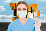 Composite image of young brunette female doctor holding a syringe