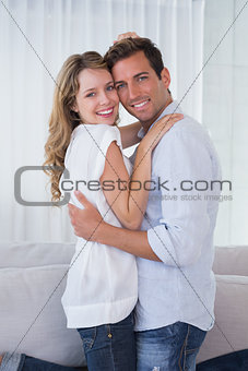 Portrait of a loving young couple embracing