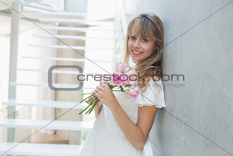 Portrait of a beautiful young woman with flowers
