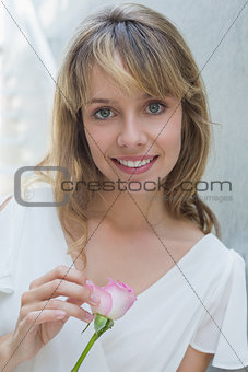Close-up portrait of a beautiful woman with flower
