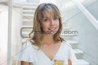 Portrait of a beautiful young woman with wine glass