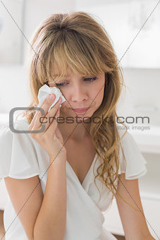 Sad young woman crying