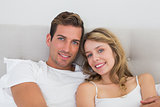 Close-up of a relaxed young couple in bed