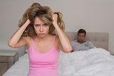 Couple not talking after an argument in bed