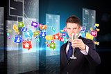 Composite image of businessman holding a champagne glass