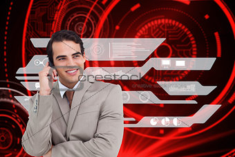 Composite image of smiling salesman on his cellphone