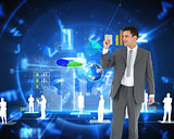 Composite image of businessman pointing up