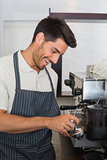 Waiter preparing espresso at coffee shop