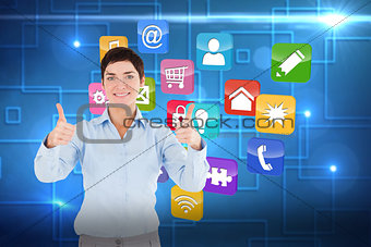 Composite image of businesswoman with the thumbs up
