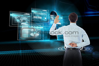 Composite image of businessman crossing fingers behind his back