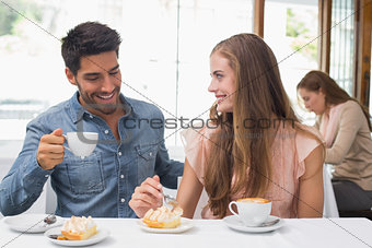 Couple having coffee at coffee shop